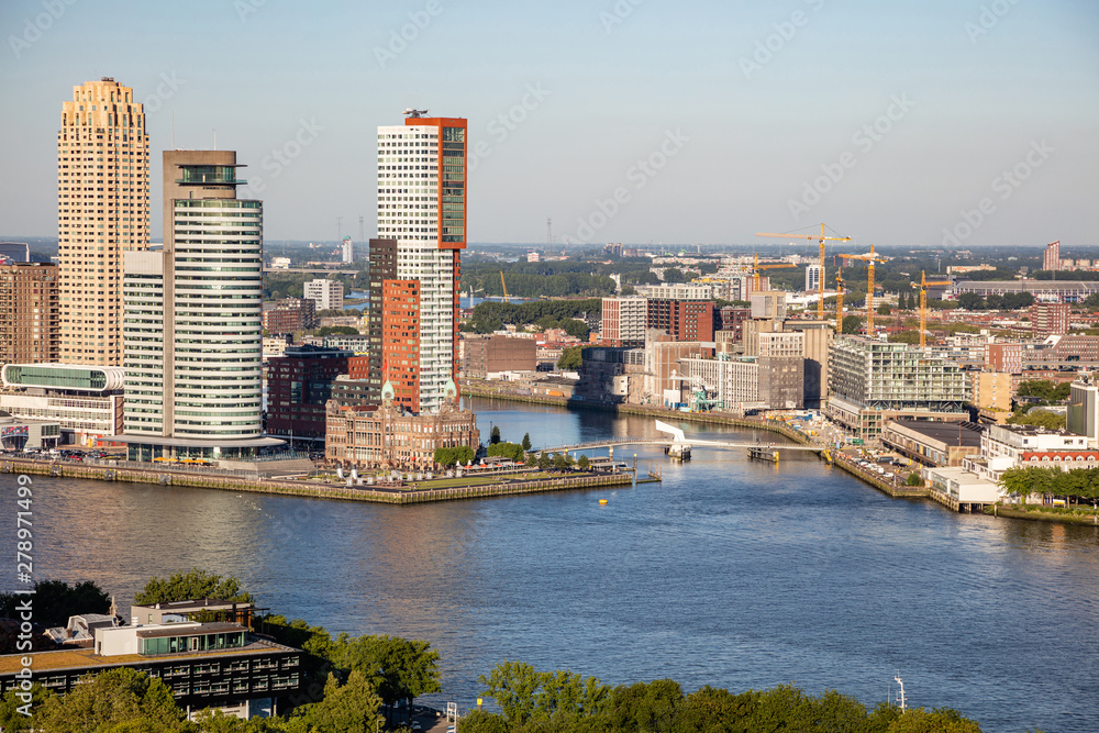 Rotterdam Netherlands cityscape and Erasmus bridge. Aerial view from Euromast tower, sunny day