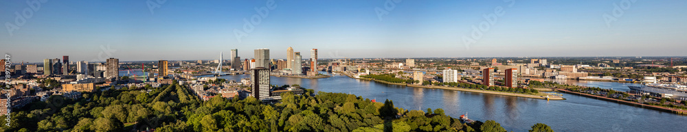 Rotterdam Netherlands cityscape and Erasmus bridge. Panoramic view from Euromast tower, sunny day