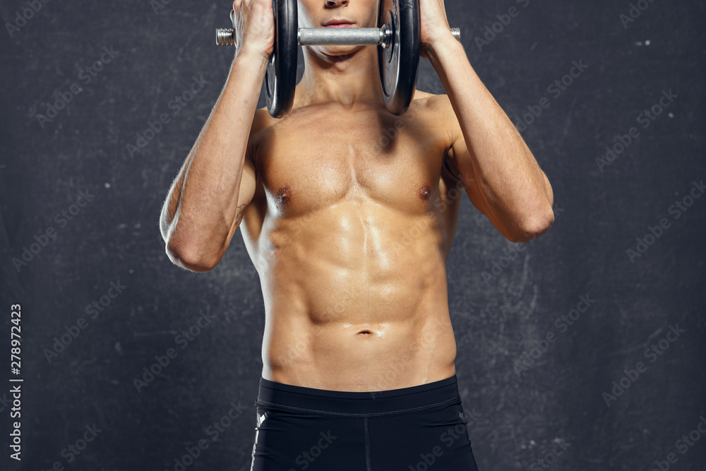 muscular man lifting weights muscular man lifting weights