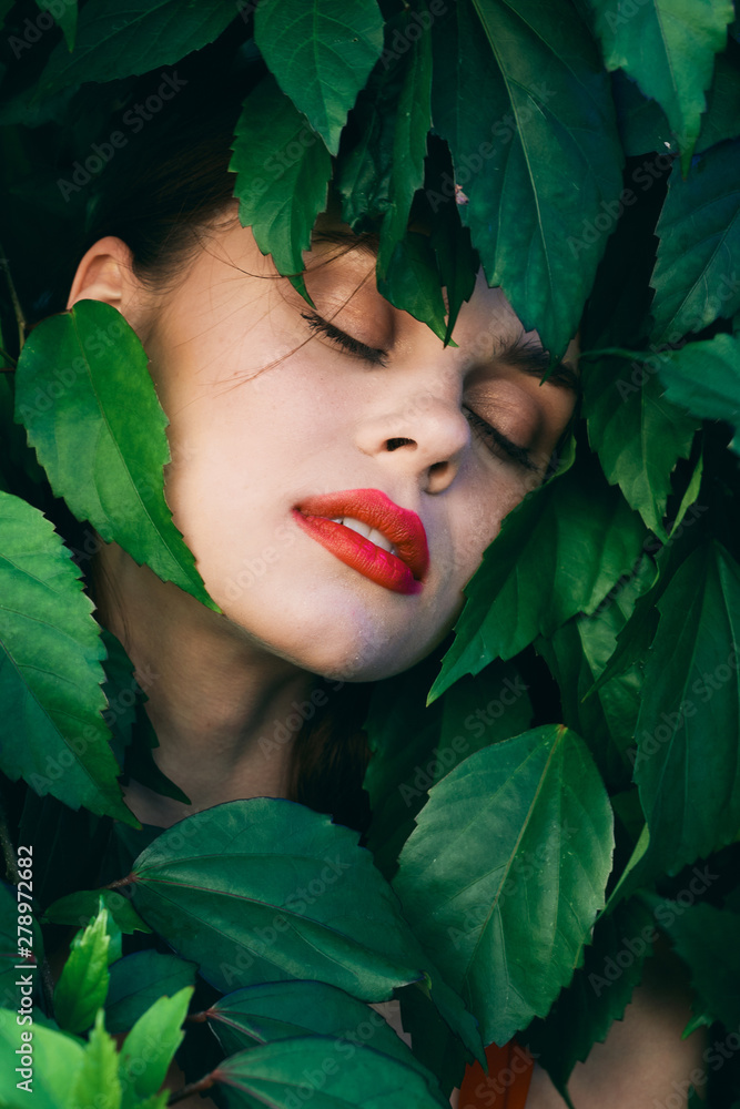 beautiful woman green leaves nature park beautiful woman green leaves nature park