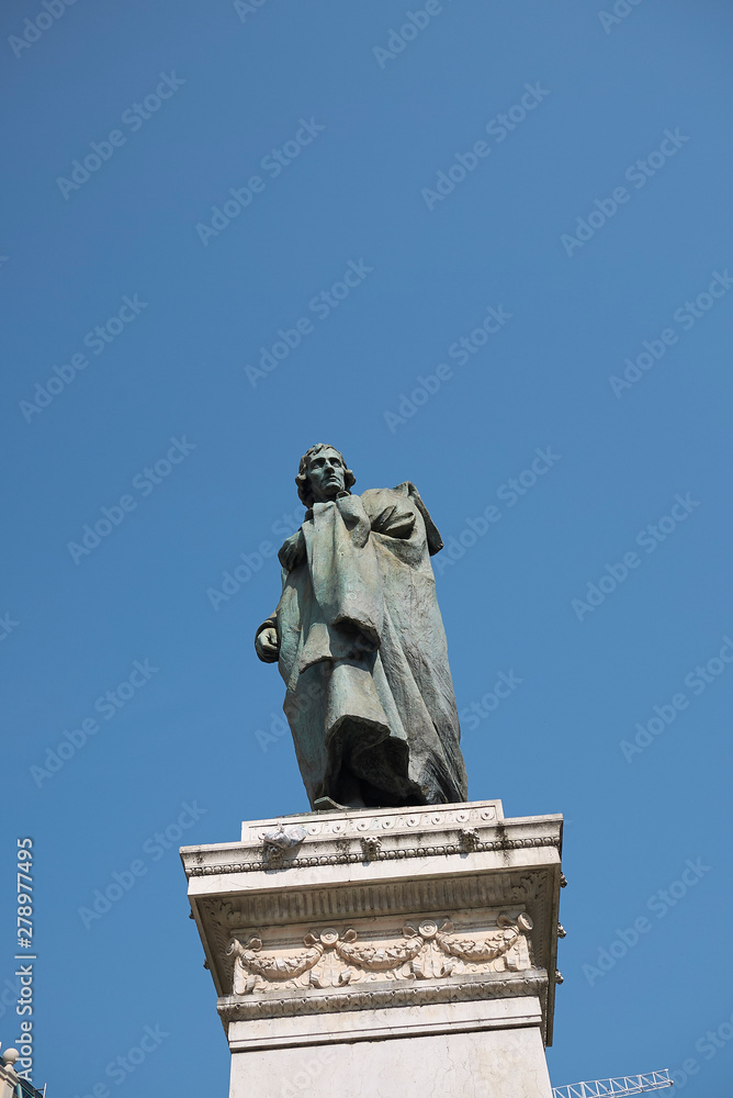 Milan, Italy - June 25, 2019 : View of Giuseppe Parini monument
