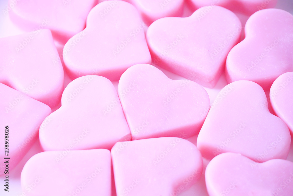 Obraz premium Closeup group of pink hearts background.