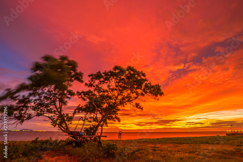 Amazing sunset.Colorful sky in the sunset. Natural Sunset Sunrise Over Field Or Meadow. Bright Dramatic Sky And Dark Ground.Sky background.