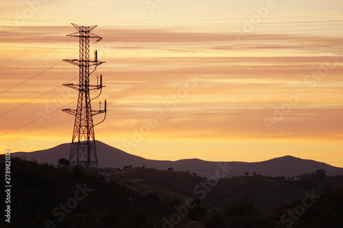 torres electricas de distribucion energia electrica   alta  tension fondo nubes multicolores