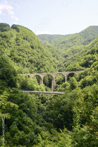 old stone bridge in the mountains