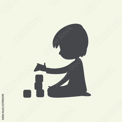 Silhouette of Baby Boy playing with toy blocks. Can be used as logo or sign. Vector Black and white illustration. isolated.