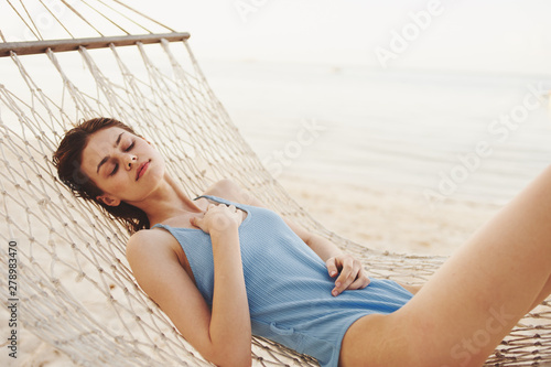 young woman relaxing on the beach