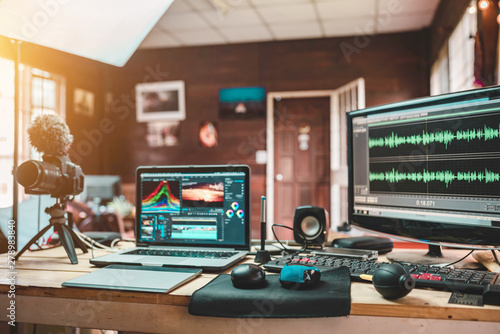 House studio desk of the content creator or Vlog sound engineer create the mixed sound video lifestyle of a freelancer and equipment the laptop camera and monitor preview