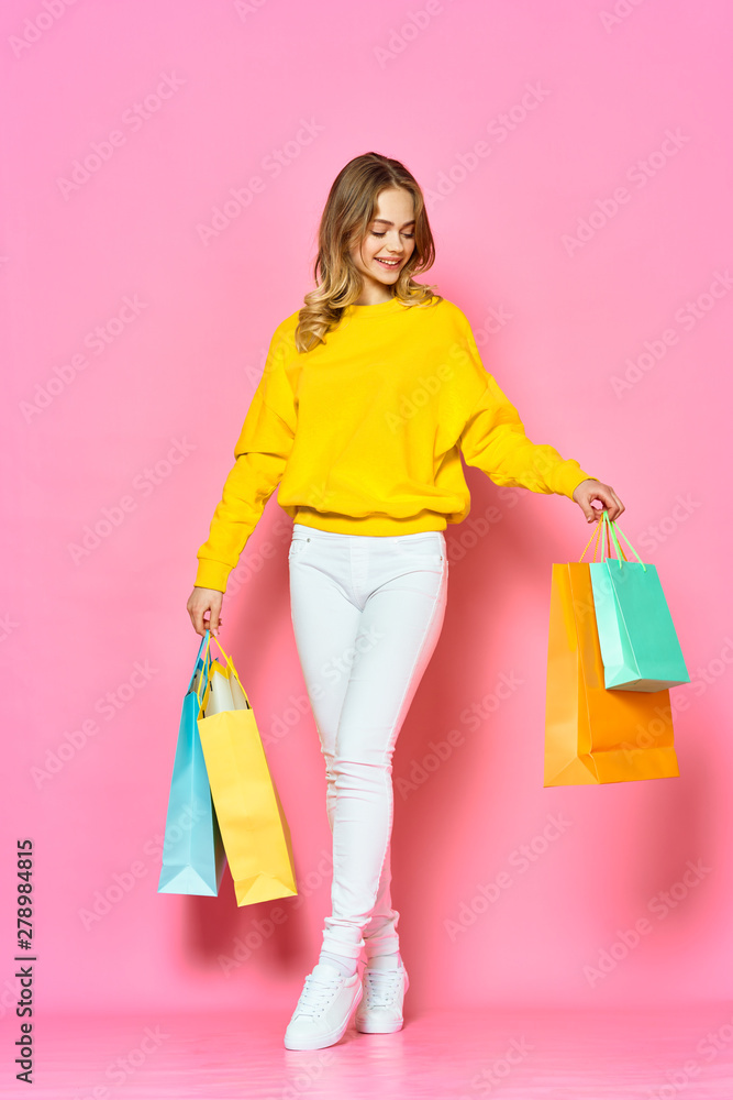 young woman with shopping bags young woman with shopping bags