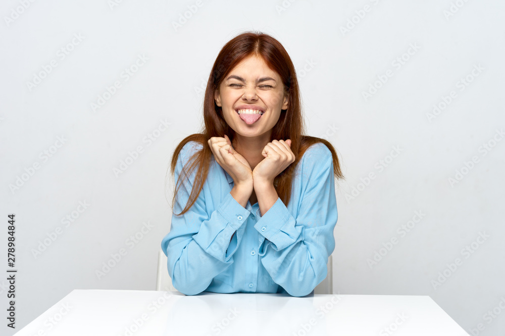 portrait of young woman sitting on sofa portrait of young woman sitting on sofa