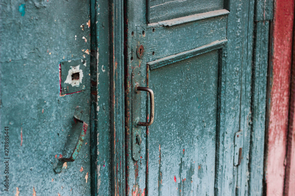 old wooden door with lock craquelure cracked paint old wooden door with lock craquelure cracked paint