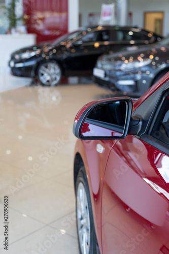 Car auto dealership. New cars at dealer showroom. Prestigious vehicles.