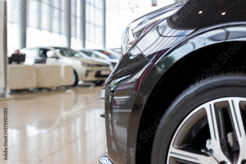 New cars at dealer showroom. For use as a background.