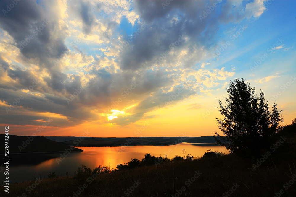 Fototapeta premium sunset over the lake
