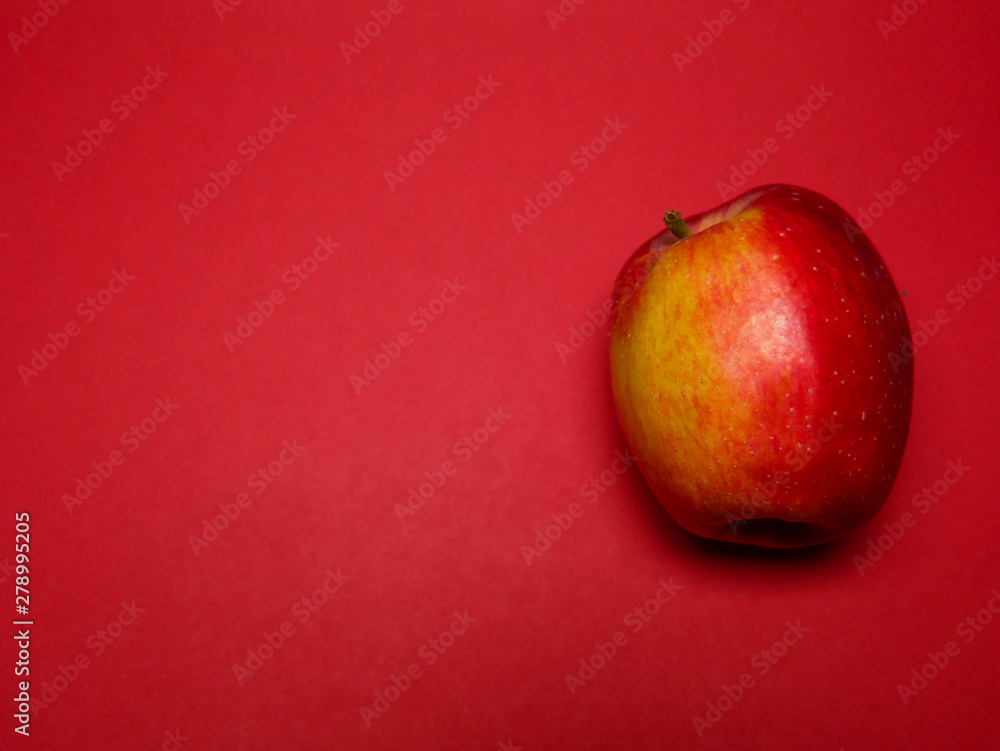 Red apples with red background Red apples with red background