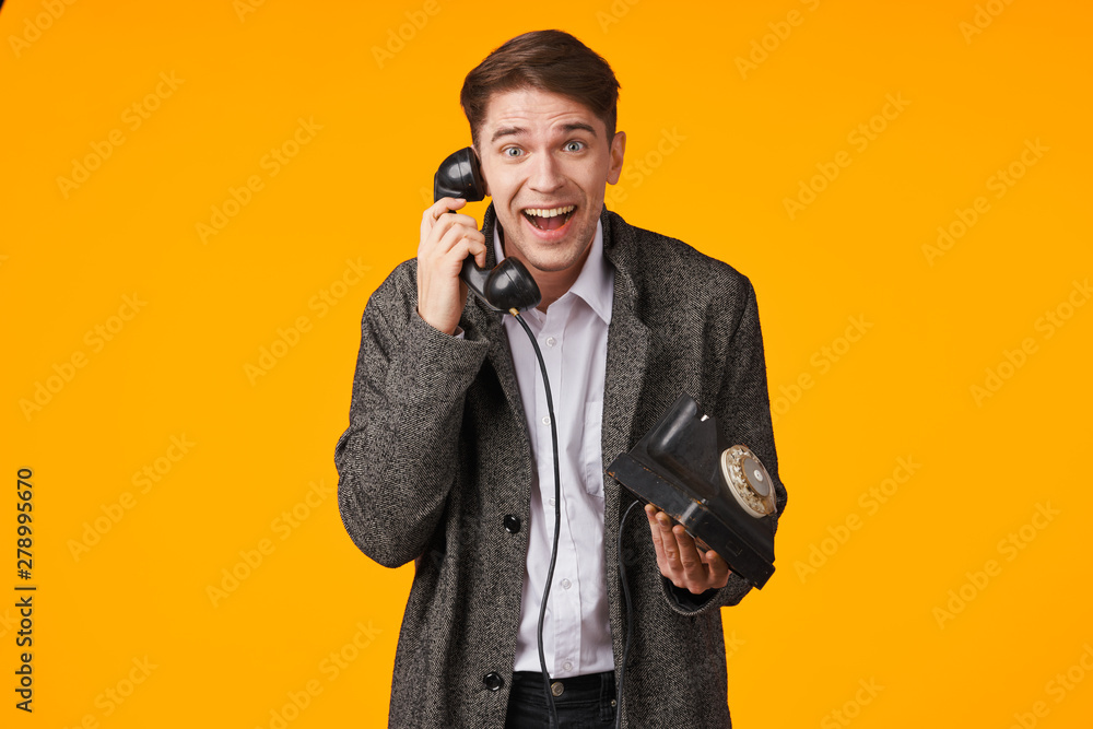 young businessman talking on the phone young businessman talking on the phone