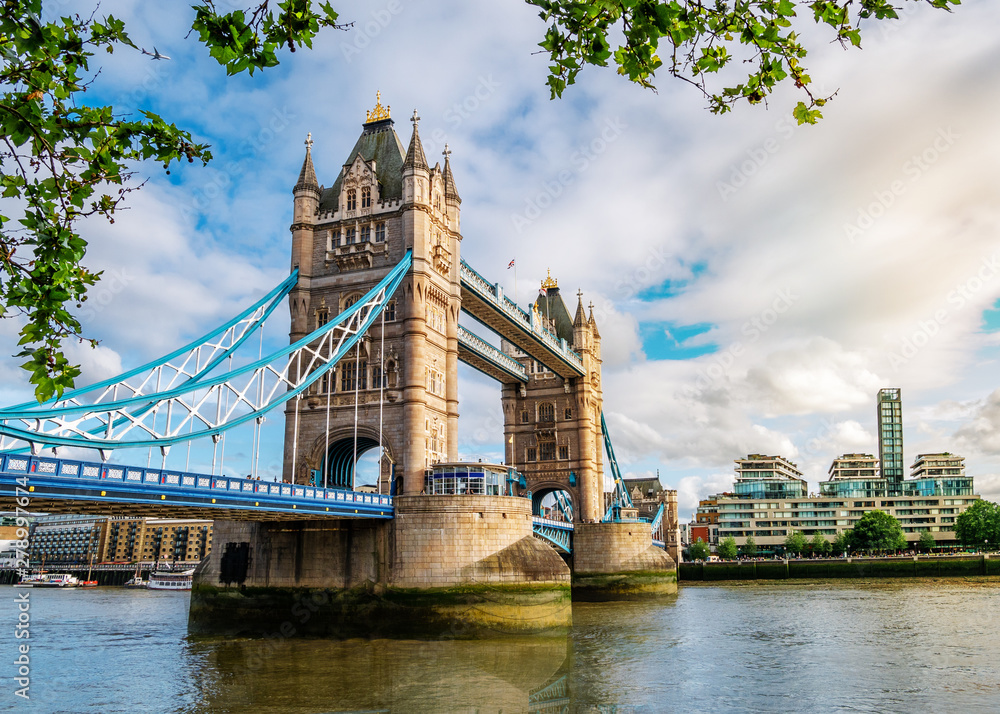 Obraz premium Wide angle view of the famous landmark of London Tower Bridge across the Thames river in England, UK
