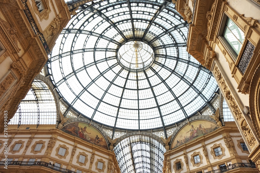 Interior of the gallery Victor Emmanuel with expensive boutiques in Milan