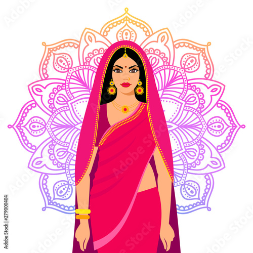 Beautiful Indian brunette young woman in sari. Beautiful Indian brunette young woman in colorful sari against the background of the  circular ornament.  Hands with mehndi pattern.
