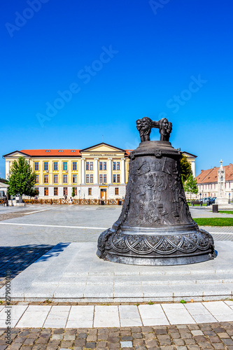 Bell monument at Alba Carolina Citadel, Alba Iulia, Transylvania, Romania, Universitatea 1 Decembrie 1918 in the background photo