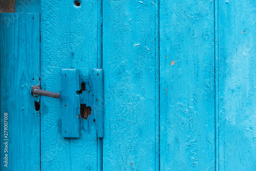 The doorknob on the old board shed