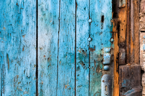 Wooden door of an abandoned warehouse.