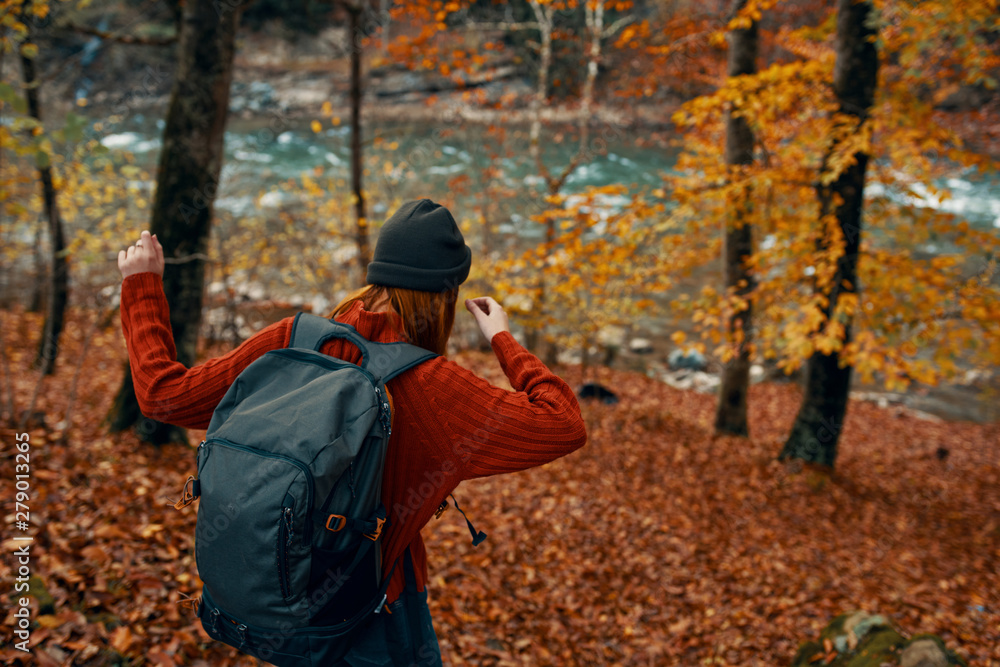 Naklejka premium boy in autumn forest