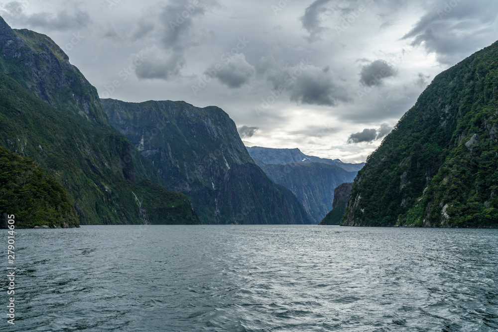 steep coast in the mountains at milford sound, fjordland, new zealand 28