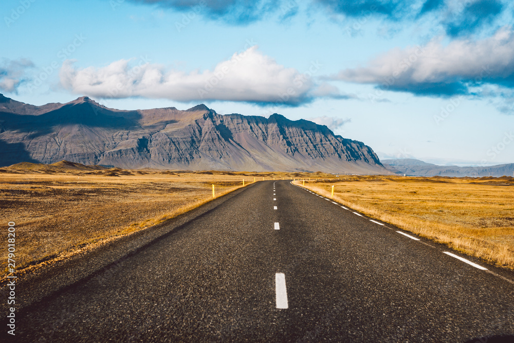 Empty road passing through amazing landscape in Iceland Empty road passing through amazing landscape in Iceland