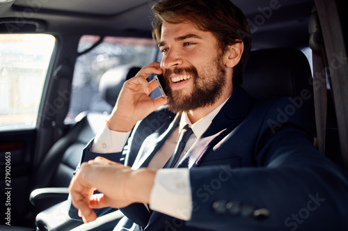 businessman talking on cell phone in car © SHOTPRIME STUDIO