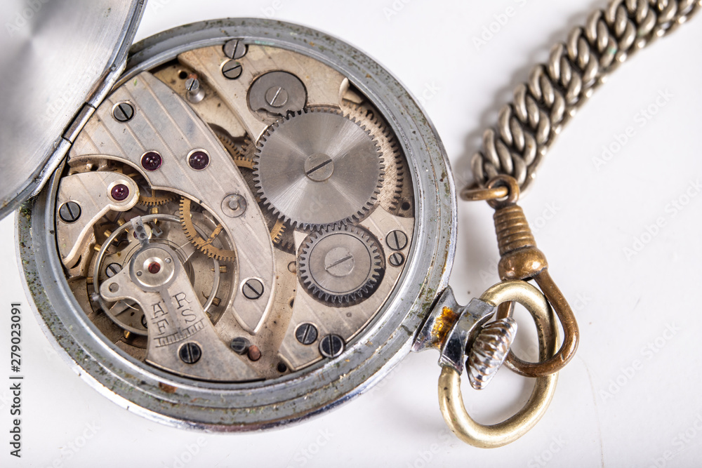 Old mechanism of an analog watch. Modes and mechanisms of the precision mechanism.