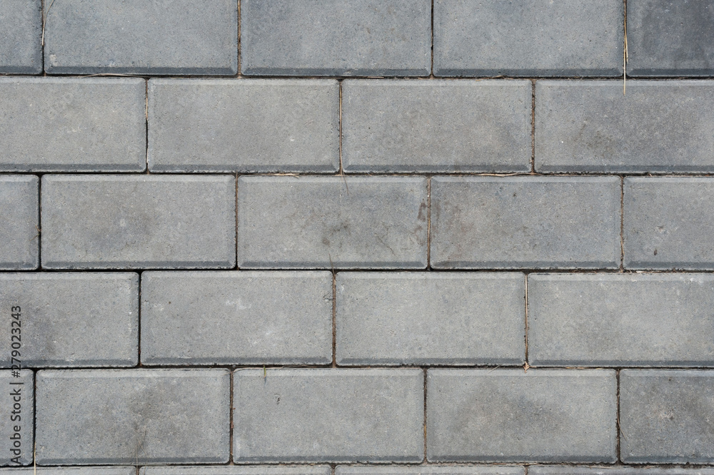 Naklejka premium Brick pavement tile, top view. Light sidewalk, pavement texture