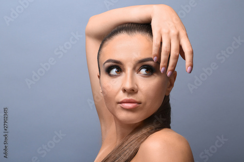 Beautiful young woman with ...
