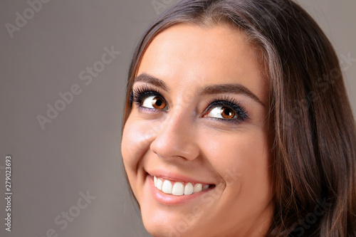 Beautiful young woman with ...