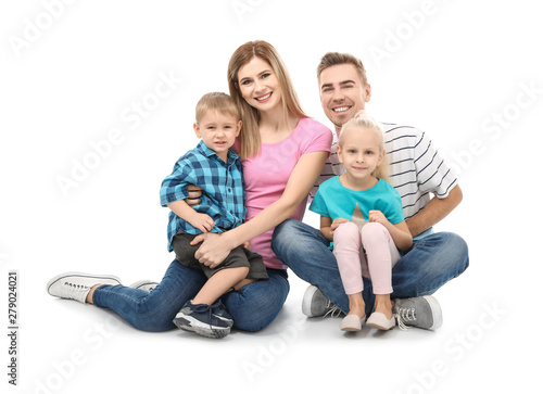 Portrait of happy family with little children on white background
