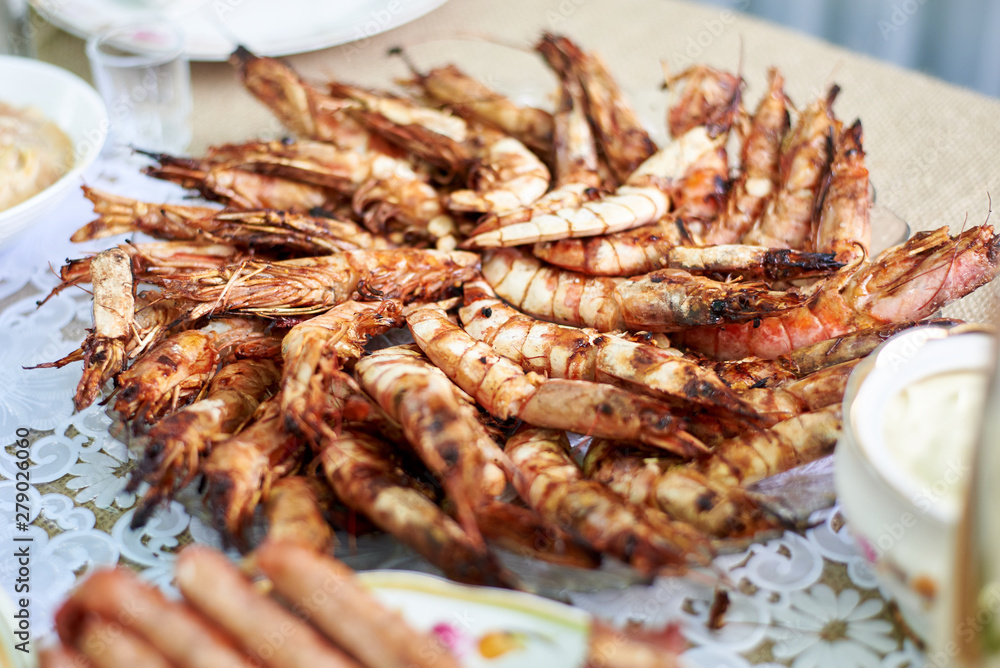 Appetizing barbecue prawns laid out on a plate