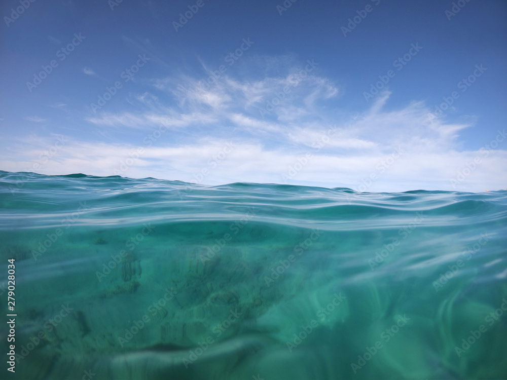 boundless seascape through the eyes of a swimmer in the open sea.