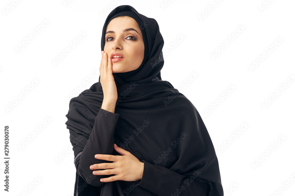 young woman with finger on her lips young woman with finger on her lips