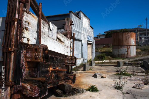 Old Cannery Building with Rusted Tank and Fish Hopper on Cannery Row in Monterey, California © Erin