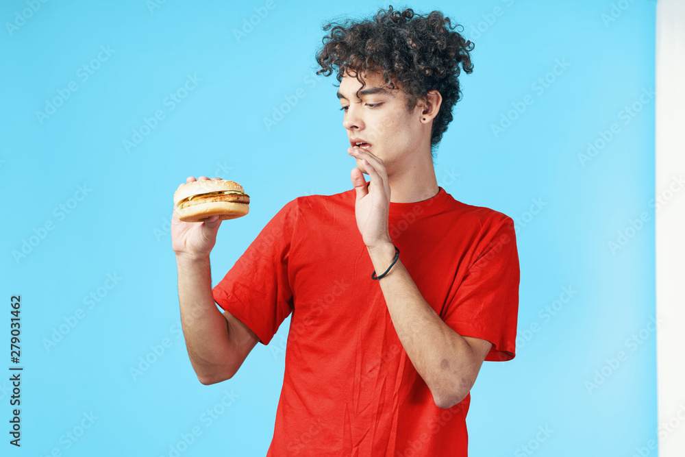 young man eating cake young man eating cake