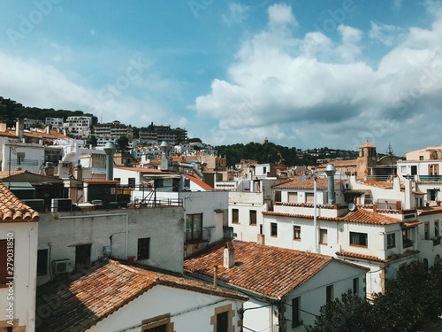 Top view to red roofs skyline of Tossa de mar