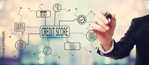 Credit score theme with businessman on blurred abstract background