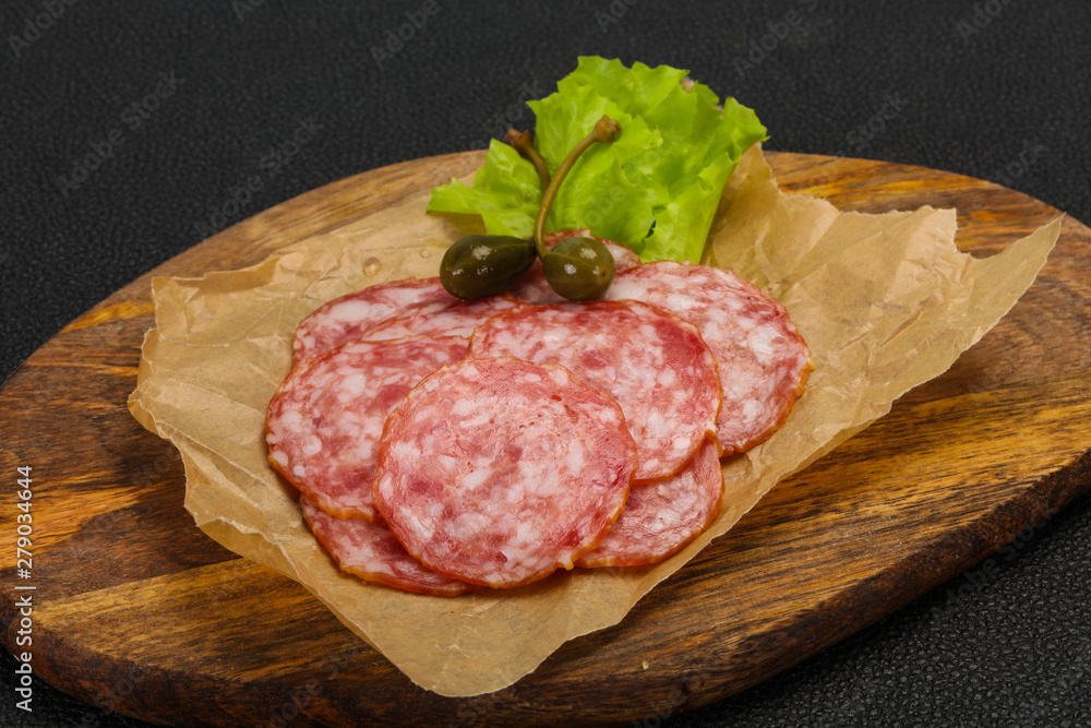 Spanish Salchichon sausage with salad Spanish Salchichon sausage with salad