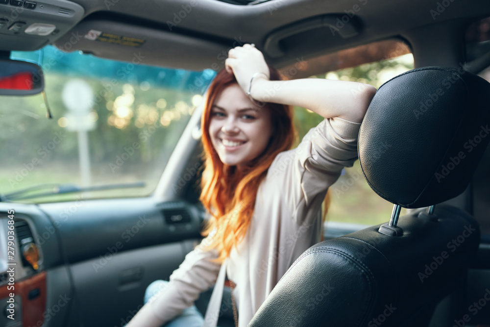young woman in car