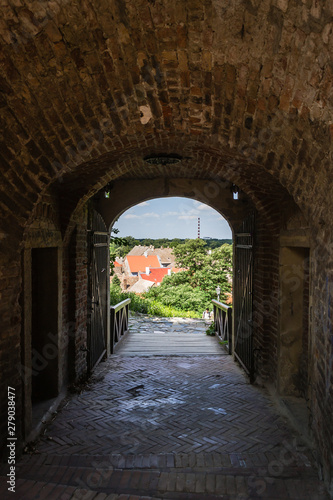 Fototapeta Naklejka Na Ścianę i Meble -  Petrovaradin, Serbia - July 17. 2019: Petrovaradin fortress, side gate and the entrance to the tunnel