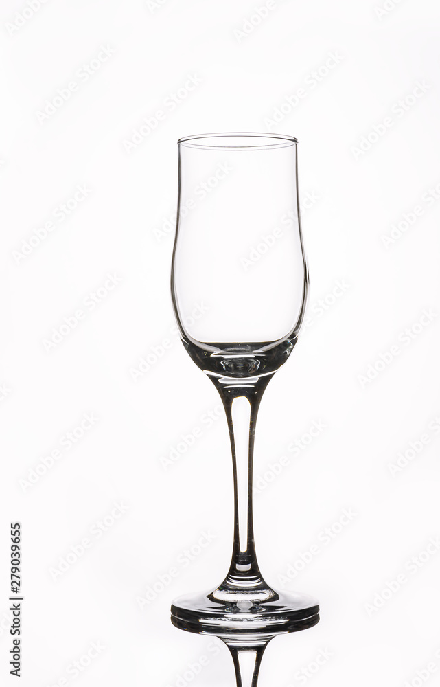 glass seklyany empty gloomy on a light background with reflection glass seklyany empty gloomy on a light background with reflection