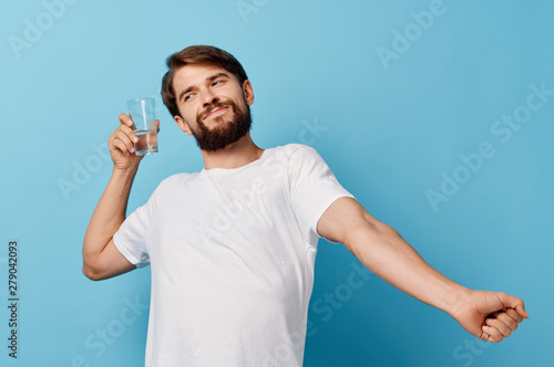 young man with glass of water