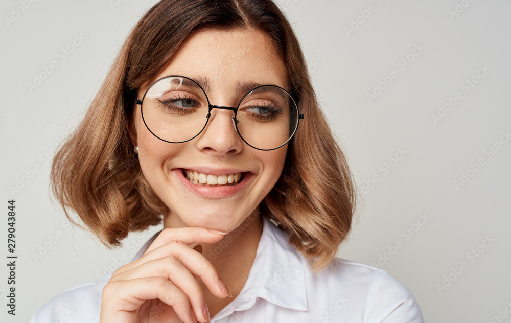portrait of young woman in glasses portrait of young woman in glasses
