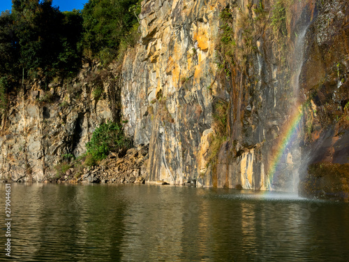 Rock cliff on Jaguari dam - rainbow photo