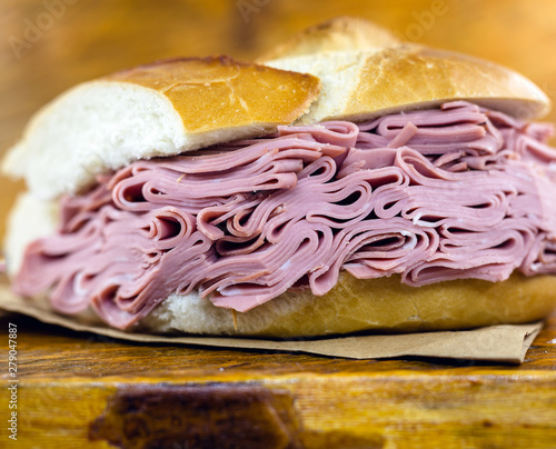 Traditional mortadella sandwich of Municipal Market (Mercado Municipal) in Sao Paulo, Brazil. Great bread snack with mortadella. photo